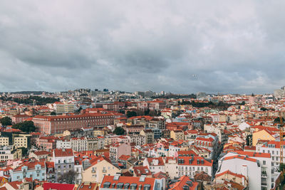 Aerial view of cityscape against sky