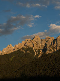 Scenic view of rocky mountains against sky