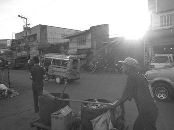 Man working on street in city