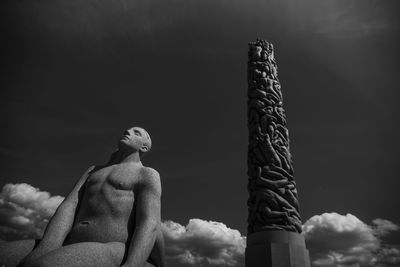 Low angle view of statue against sky