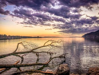 Scenic view of sea against dramatic sky