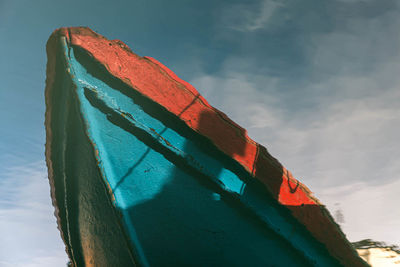 Low angle view of built structure on beach against sky