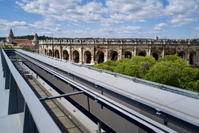 View of bridge against cloudy sky