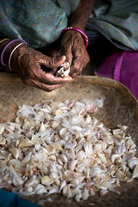 Close-up of man preparing food