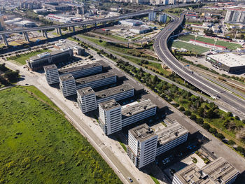 High angle view of street amidst buildings in city