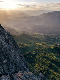 Scenic view of landscape against sky during sunset