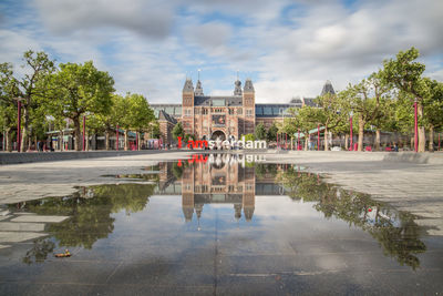 View of pond in city