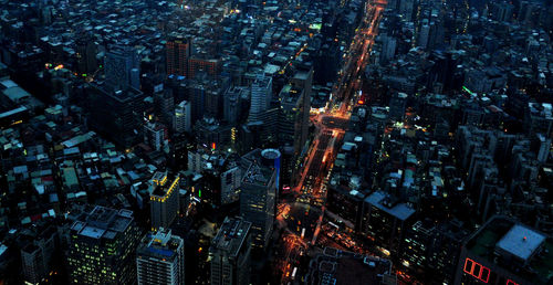Aerial view of cityscape at night