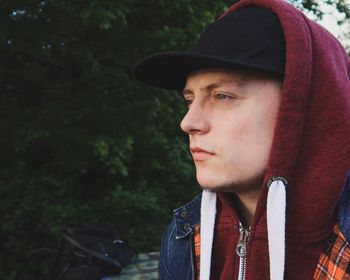 Portrait of young man looking away