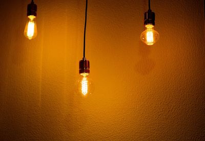 Close-up of illuminated light bulb