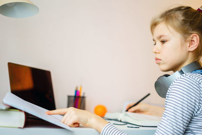 Girl studying at home