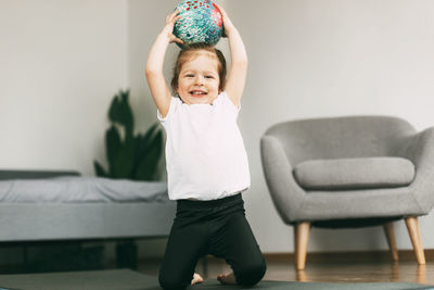 Portrait of cute smiling boy at home