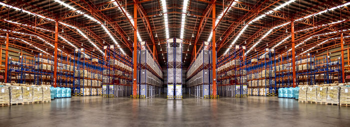 Large distribution warehouse interiors, logistics center. 