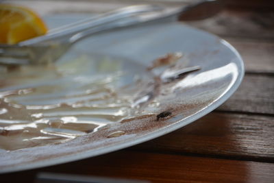 Close-up of empty plate on table