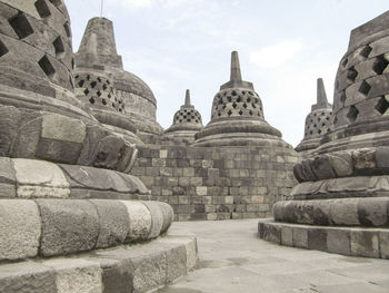 Ancient temple against sky