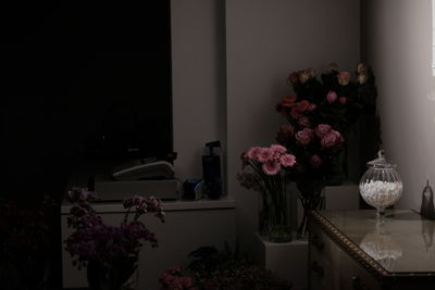 Flower vase on table at home