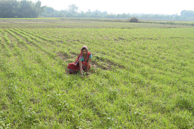 Woman working in agricultural field