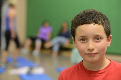 Close-up portrait of smiling cute boy