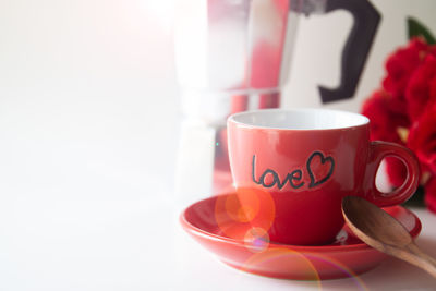 Close-up of coffee cup on table