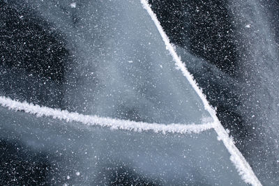Aerial view of vapor trails in snow