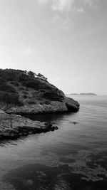 Scenic view of bay against sky