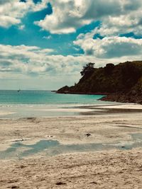 Scenic view of beach against sky