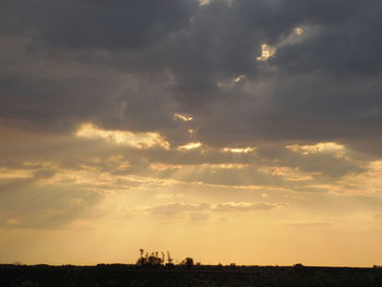 Scenic view of landscape against cloudy sky