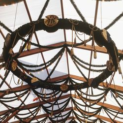 Low angle view of metallic structure against sky