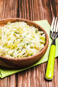 High angle view of rice in bowl on table