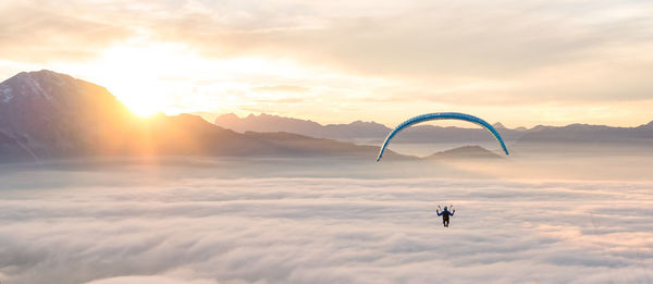 Scenic view of mountain against sky during sunset