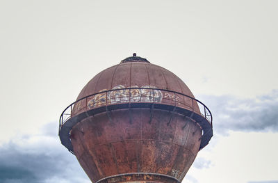 Low angle view of water tower against sky