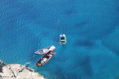 High angle view of boats moored at sea