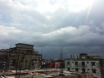 Built structure against cloudy sky