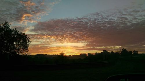 Scenic view of sunset over landscape