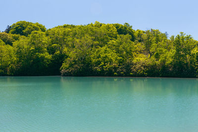 Scenic view of lake against sky during autumn