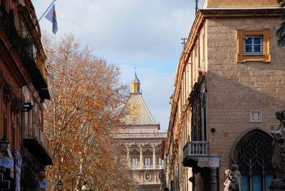 Low angle view of buildings against sky