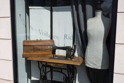 Clothes hanging on table in store