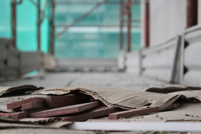 Close-up of damaged book on table