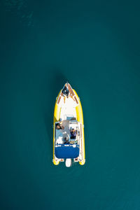 High angle view of people sailing in sea