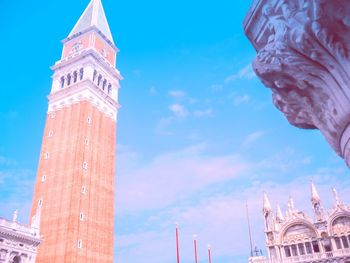 Low angle view of clock tower against sky