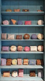 Various cushions on shelves