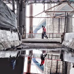 Woman standing in front of building