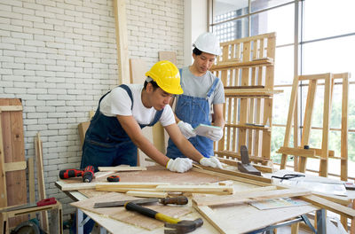 Carpenters working at workshop