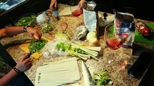 High angle view of man preparing food in kitchen