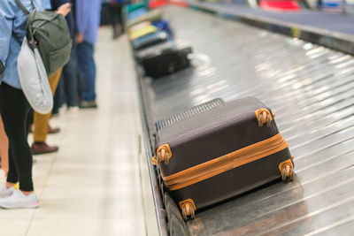 Luggage on conveyor belt at airport