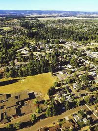 Aerial view of agricultural field against clear sky