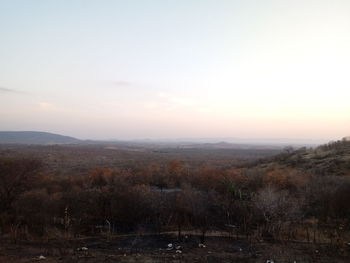 Scenic view of landscape against sky during sunset