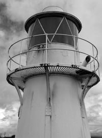 Low angle view of water tower against sky