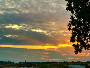 Scenic view of dramatic sky during sunset