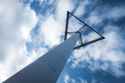 Low angle view of wind turbine against sky